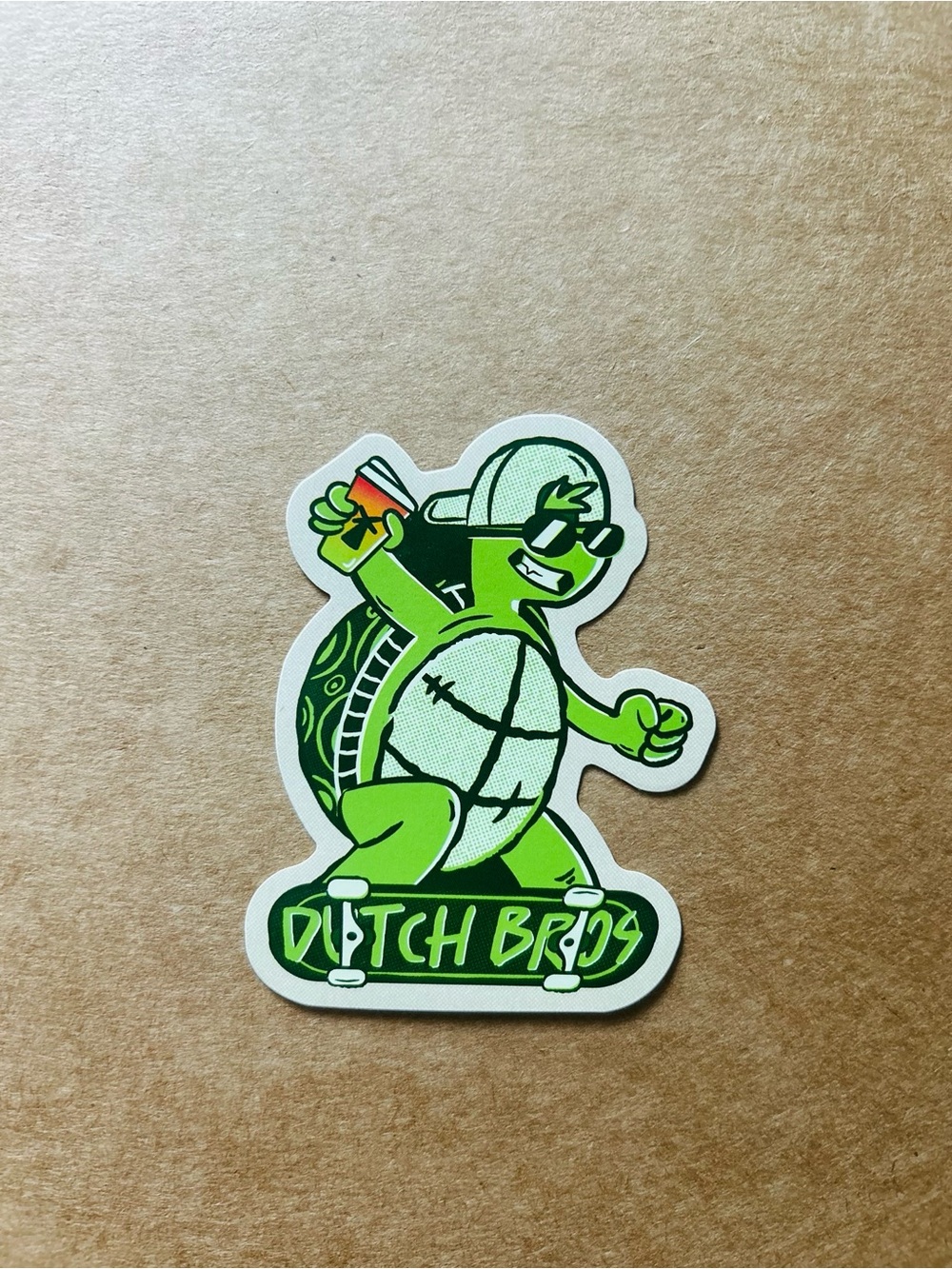Dutch Bros skateboarding turtle sticker